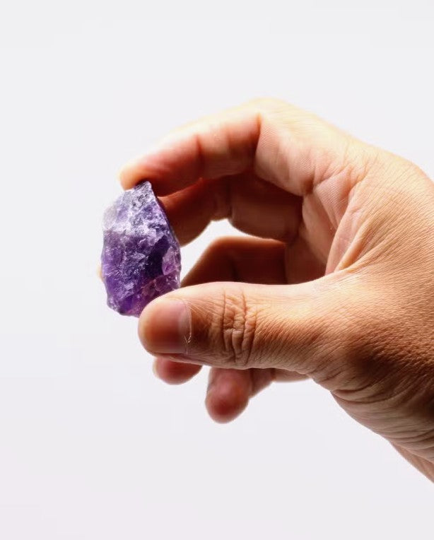 Individual raw Amethyst crystals with natural purple colouring and crystal textures