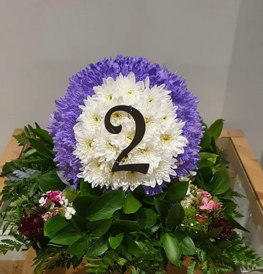Personalised fresh floral number tribute with purple and white flowers and greenery