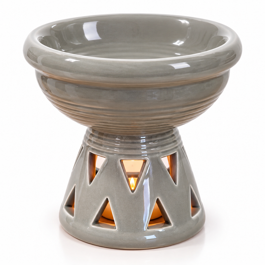 Grey glazed ceramic oil burner with decorative triangular cut-out design