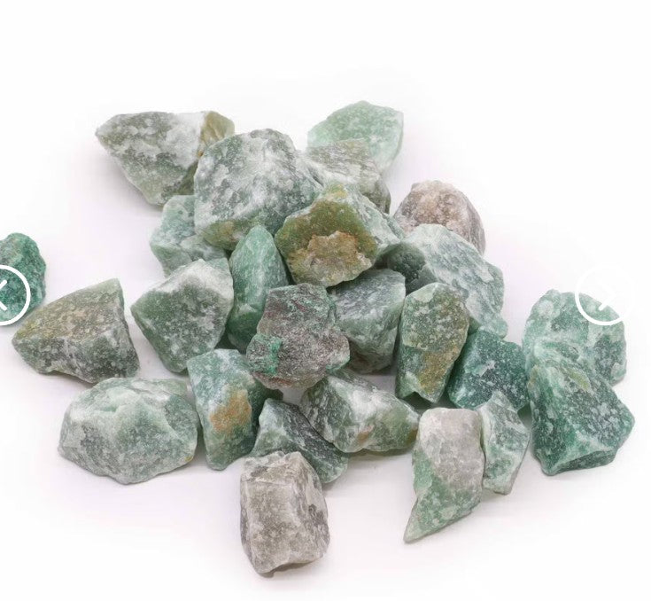 Raw Jade crystal pieces showing natural green colouring and unique textures