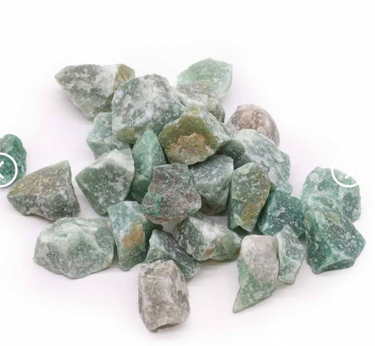 Raw Jade crystal pieces showing natural green colouring and unique textures