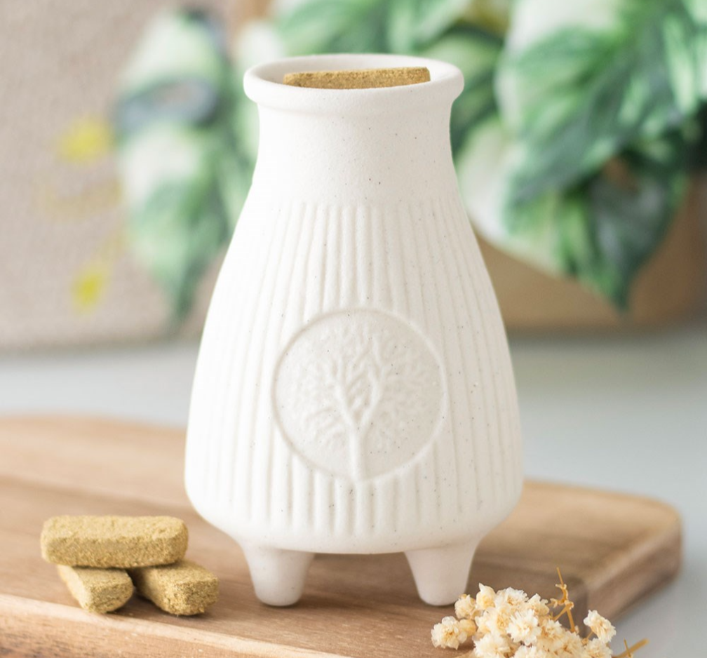 White ceramic Palo Santo brick burner with raised design